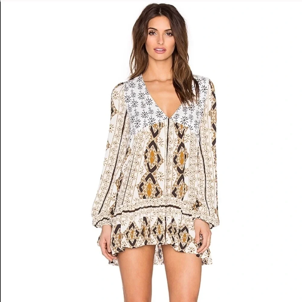 Free people Mixed print tunic. Size s